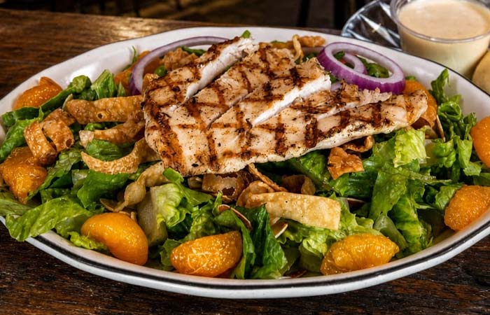 Grilled chicken salad with lettuce, mandarin oranges, onions at our Bar in Red Wing MN.