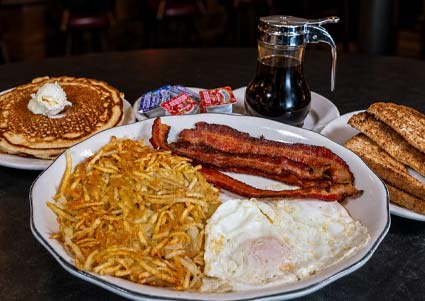 Classic breakfast plate at our Red Wing MN restaurant, with pancakes, bacon, and eggs served fresh.